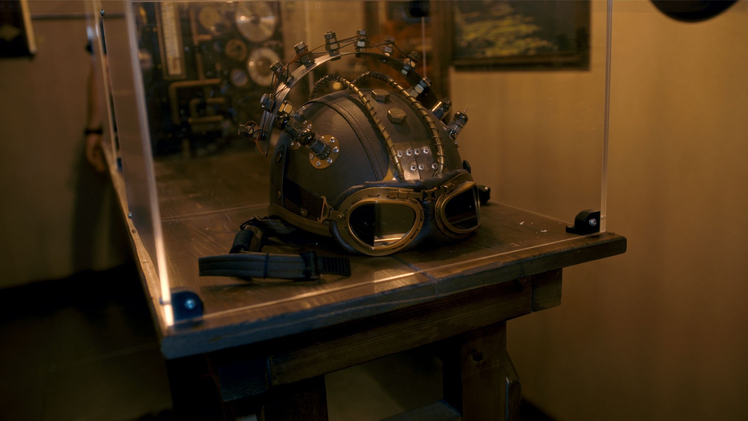 Mysterious science headgear. Enigma Quests Escape Room Inventor's Odyssey Through Time