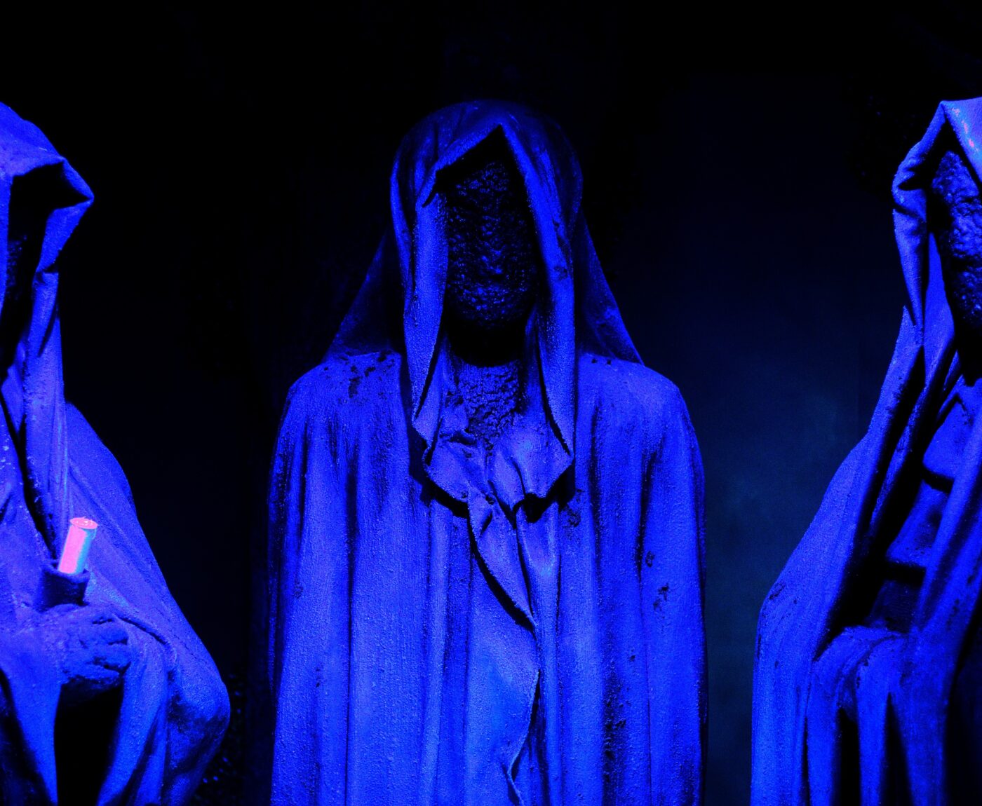 Glowing blue wizards in the dark