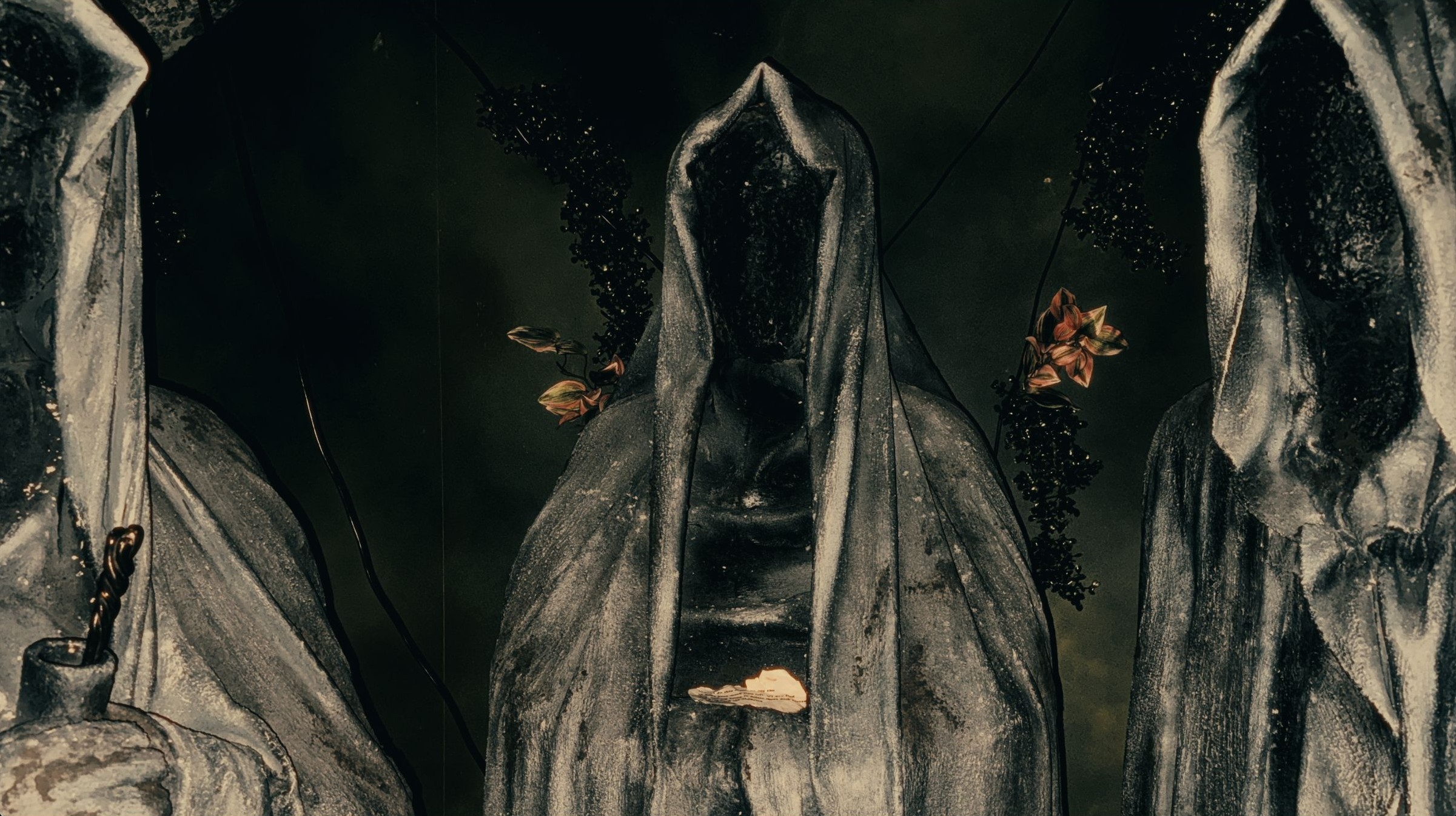 Hooded statue of men. Enigma Quests Escape Room World of Witchcraft and Wizardry